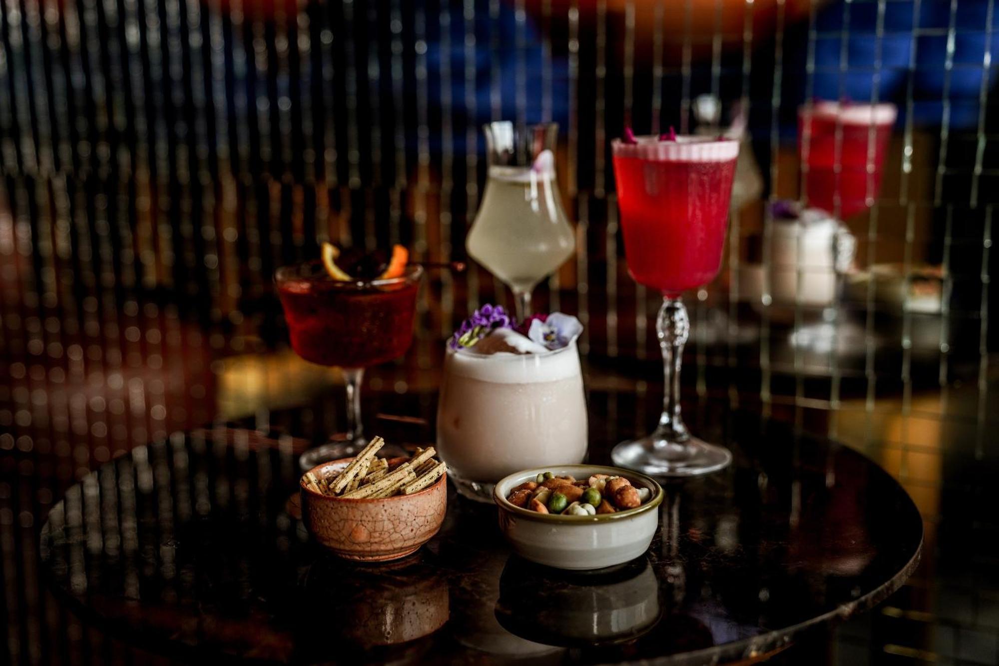 Art Mai Gallery Nimman Hotel Chiang Mai Exterior photo A selection of cocktails at the bar